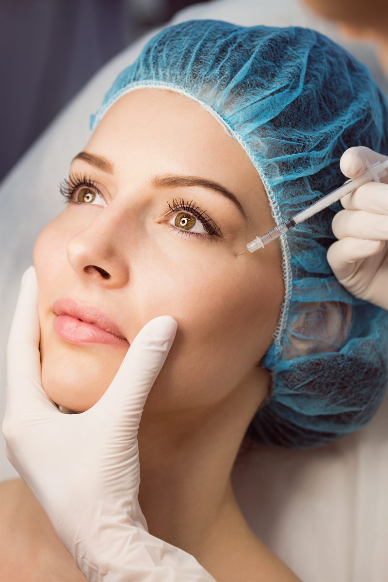 Patient receiving an aesthetic injection treatment